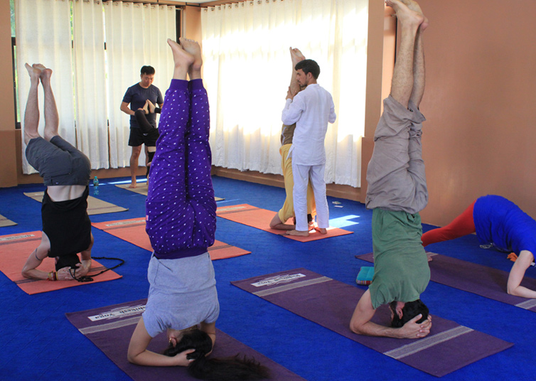 Yoga practice space at 100 Hour Yoga Teacher Training in Rishikesh – SV Yoga School (Swami Vivekananda Yoga School) retreat
